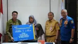Penyaluran Santunan TASPEN untuk Ahli Waris Petugas Pemadam Kebakaran DKI Jakarta