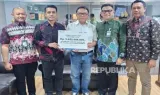 Pencairan Klaim Asuransi Kapal Rp 5,65 Miliar oleh BRI Insurance untuk Pemulihan Bisnis Nasabah